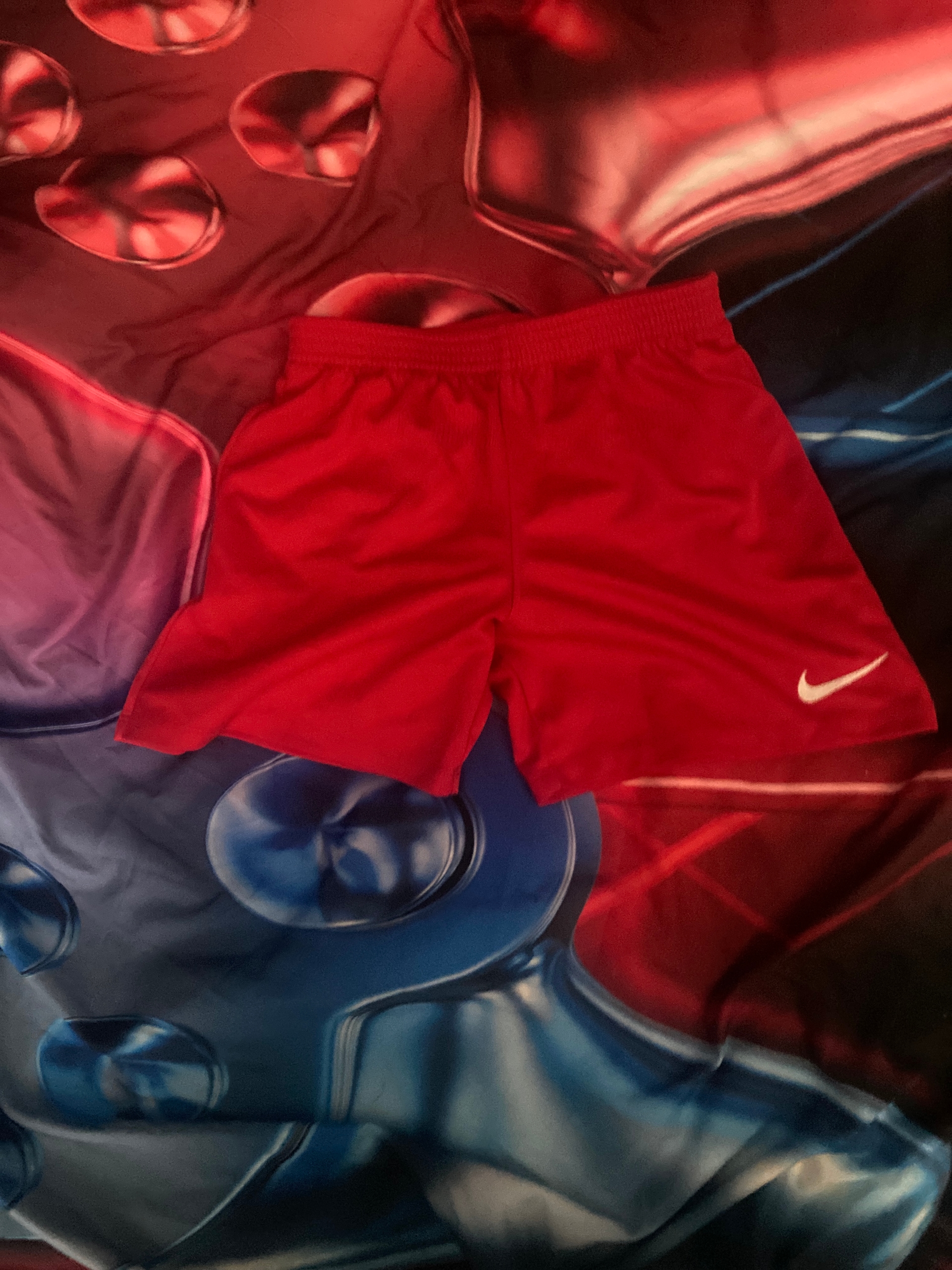 Red nike shorts