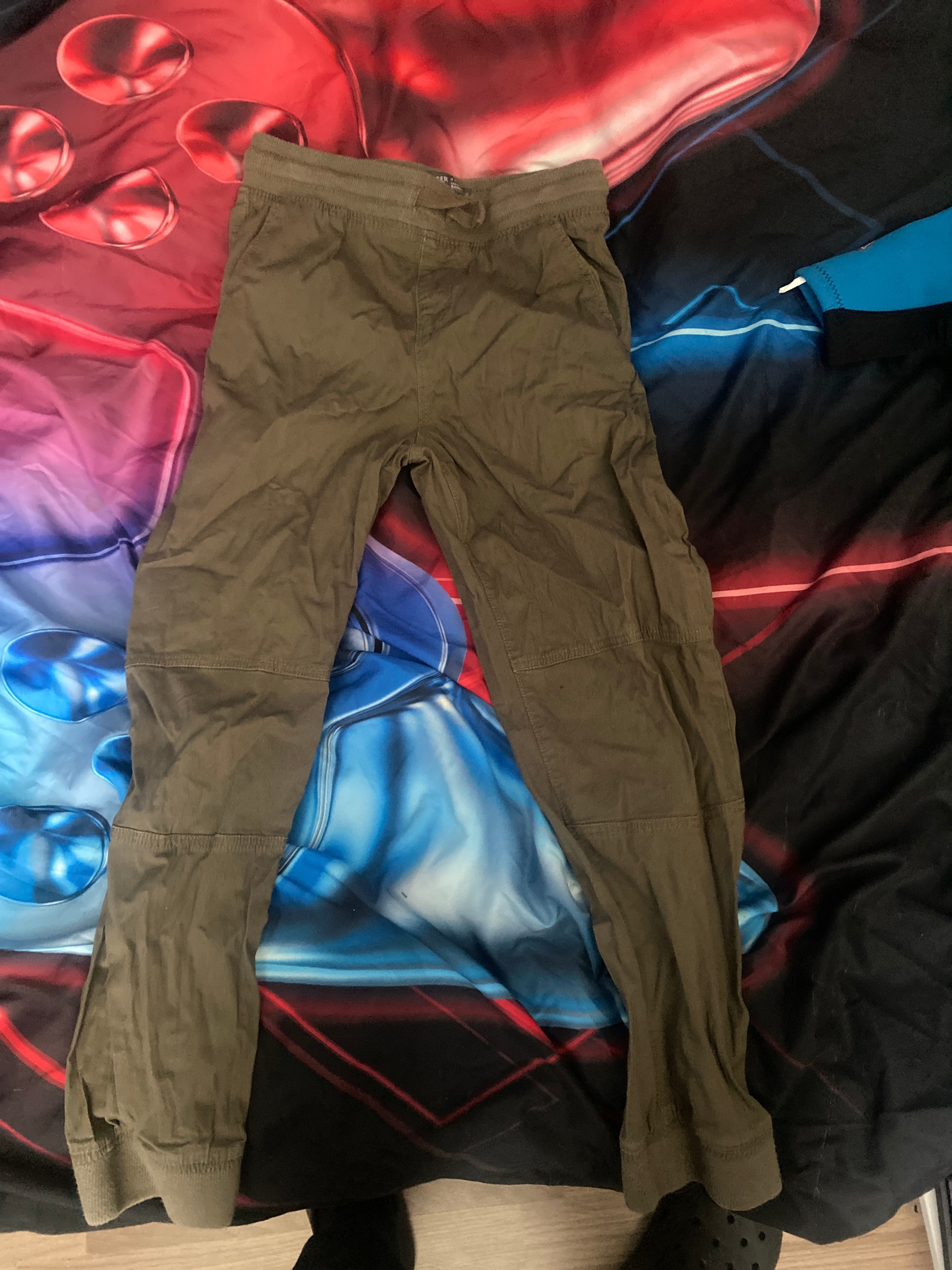 Green cargo trousers